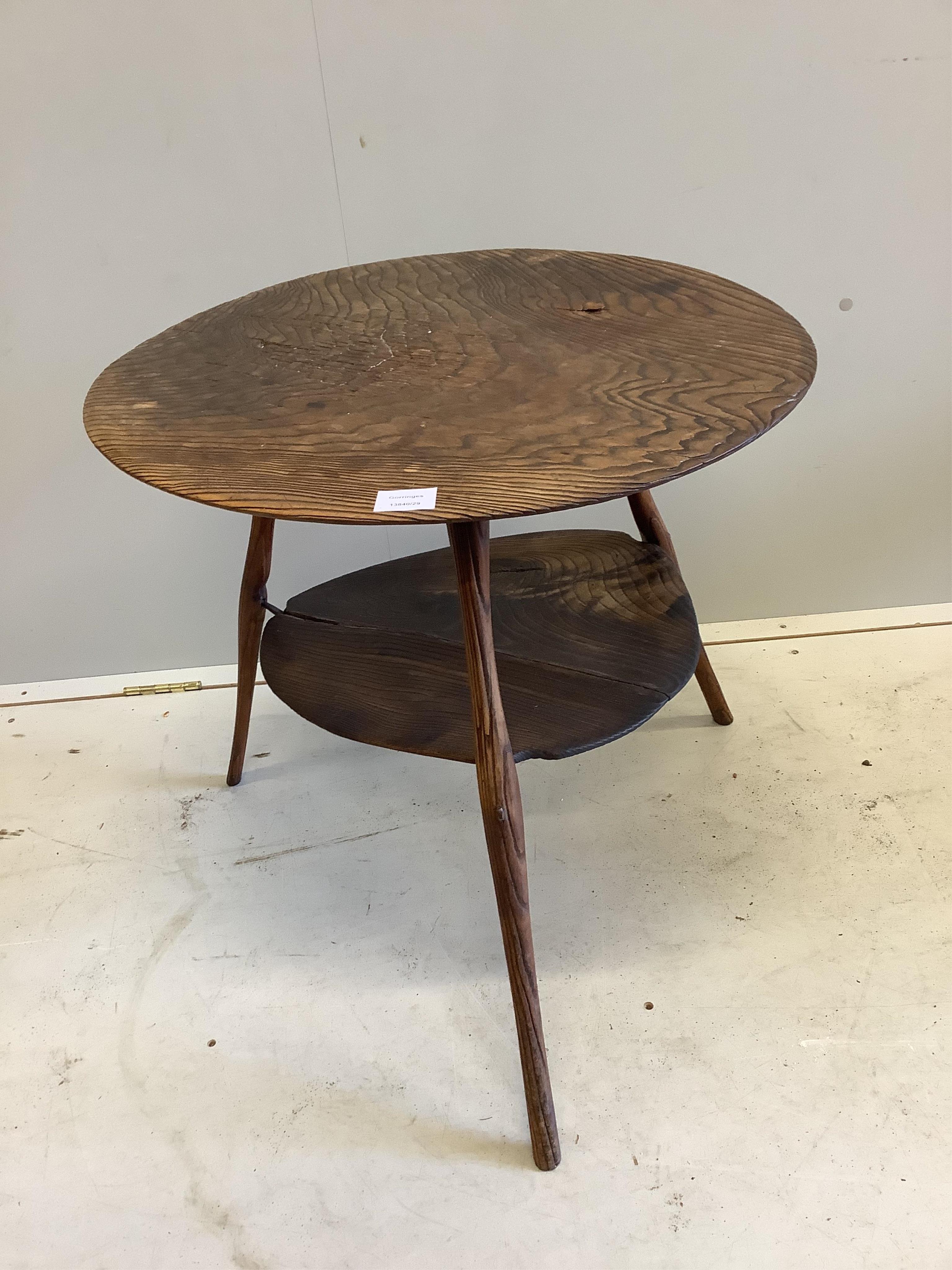 An unusual 18th century weathered elm cricket table, width 61cm, height 60cm. Condition - fair to good